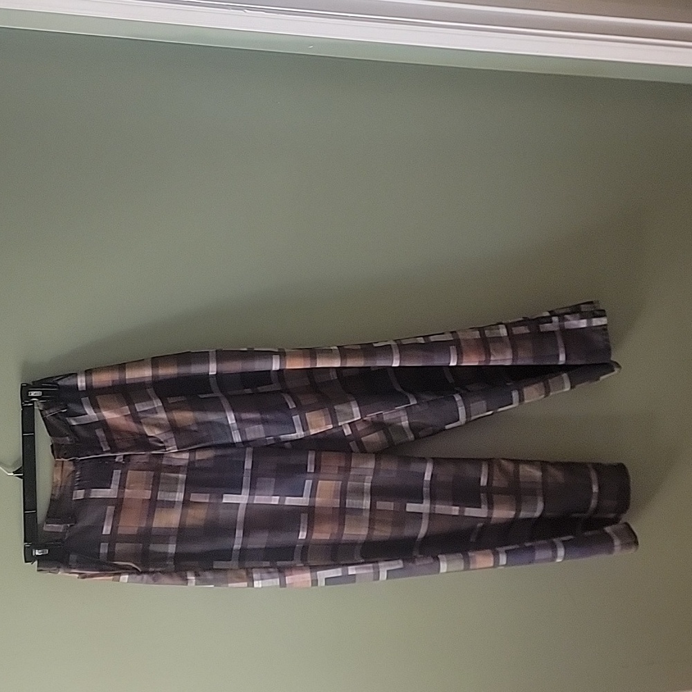 Size Medium. Loose fitting plaid pants